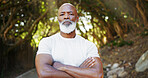 Arms crossed, fitness and portrait of black man in nature for runner, confidence or health. Retirement, exercise pride and wellness with senior person outdoor for mobility training, athlete and hobby