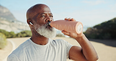 Buy stock photo Fitness, drink water and senior man with earphones for audio, wellness and health on break. Hydration, thirsty runner and black person with bottle for electrolytes, exercise recovery or music outdoor
