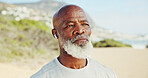 Thinking, senior black man and fitness on beach with vision, exercise and decision for break. Elderly person, earphones and reflection for training at sea, daydreaming and choice for retirement hobby