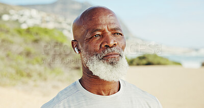 Buy stock photo Thinking, senior black man and fitness on beach with vision, exercise and decision for break. Elderly person, earphones and reflection for training at sea, daydreaming and choice for retirement hobby