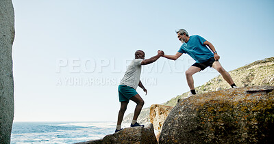 Buy stock photo Senior people, helping and hiking on mountain for fitness, travel adventure and climbing cliff. Elderly men, friends and support for trekking journey, teamwork and backpacking challenge of retirement