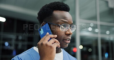 Buy stock photo Night, phone call and black man in hospital, conversation and schedule with emergency room. Evening, medical service or African person in clinic, cellphone or contact with late shift, bokeh or health