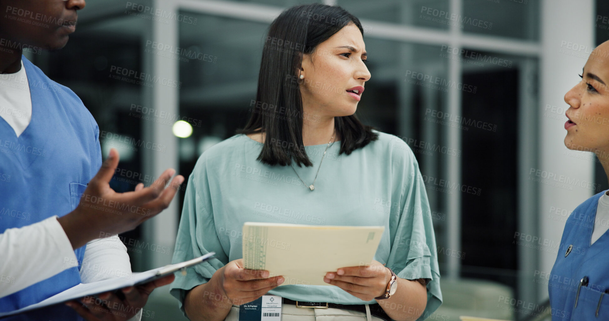 Buy stock photo Discussion, documents and nurse or people in hospital for ward clerk, icu emergency and medical records at night. Healthcare administration, surgery schedule and team with man and women for overtime