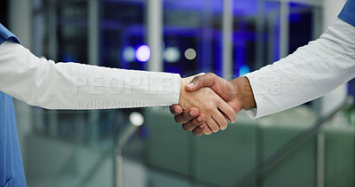 Buy stock photo Medical, night and team in hospital with handshake, thank you and support in end of surgery. Bokeh, collaboration and nurse in clinic with hands together, well done and overtime in post operation.