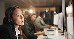 Woman, consultant and night with headset for online advice or customer service in call center. Female person, agent or working late with mic for virtual assistance, support or help in workplace