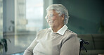Senior woman, wheelchair and thinking at window, smile and reflection for recovery in retirement. Elderly person with disability, happy and perspective with rehabilitation, injury or memory in home