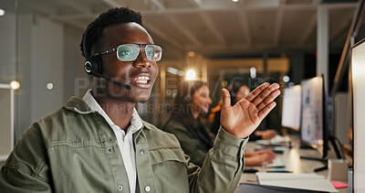 Buy stock photo Call center, man and talking with headset at night for tech support, network resolution and FAQ. Coworking, agent and speaking to international client for inbound query, online assistance and flare
