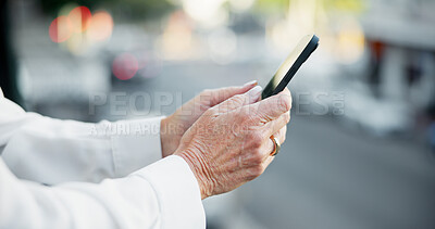 Buy stock photo Hands, phone and texting on balcony at office, contact and check notification for deal at company. Person, smartphone and scroll with mobile app, break or post with social network for job at agency