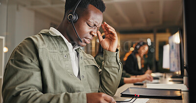 Buy stock photo Call center, customer service and man in office with burnout from headache, telecom or working overtime. Late, tired male person and migraine at night with client complaint, bad review or mistake
