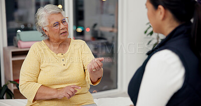 Buy stock photo Mature woman, patient and consultation with doctor for advice, prescription or diagnosis in hospital. Female person, communication and support for dosage, treatment steps or discussion in clinic