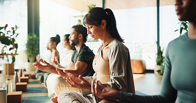 Buy stock photo Zen, people and relax in yoga class with lotus pose for meditation, chakra healing or wellness. Calm, group or yogi in health studio with mindfulness exercise for inner peace, gratitude or awareness.