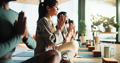 Buy stock photo Zen, people and relax in yoga class with prayer hands for meditation, spiritual healing and wellness. Calm, group or yogi in health studio with mudra for mindfulness, chakra balance and namaste pose.