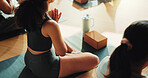 Zen, woman and group in yoga class with prayer hands for meditation, spiritual healing and wellness. Above, people and relax in health studio with mudra for inner peace, mindfulness and namaste pose.