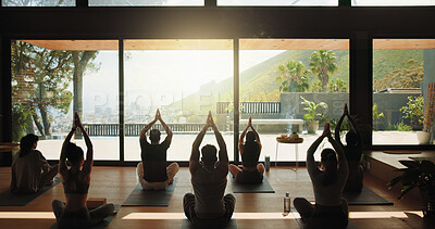 Buy stock photo Back, fitness and people in yoga class together for morning session or holistic health course. Exercise, stretching and window view with yogi group in wellness studio for awareness or balance