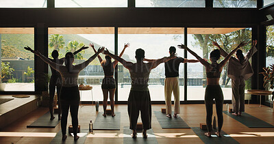 Buy stock photo Back, exercise and people in yoga class together for morning session or holistic health course. Fitness, stretching and window view with yogi group in wellness studio for awareness or balance
