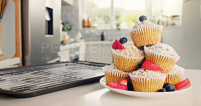 Buy stock photo Cupcakes, kitchen and baking with fruit for sweet dessert, recipe or pastry creation in home. Empty, baked and muffin with icing sugar, strawberries or blueberries for treat or cake serving on plate