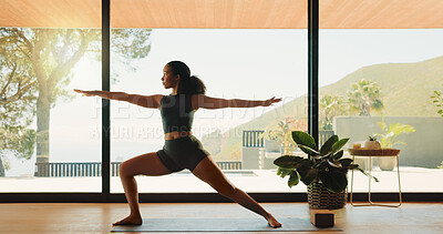 Buy stock photo Woman, yoga and stretching with zen for fitness, balance or health and wellness in serene studio. Calm, female person or yogi with warrior pose for mindfulness, awareness or physical exercise in dojo