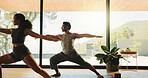Yoga, couple and stretching for fitness, home and people with balance for warrior pose and endurance. Healthy, man and woman with posture for inner strength, flexible or routine for wellness in house