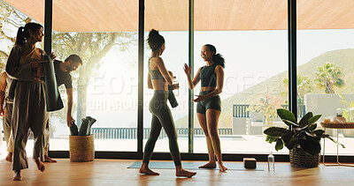 Buy stock photo Instructor, happy people and walk in yoga class to start practice, welcome or talk in fitness studio. Coach, clients and enter health club for holistic exercise, wellness and greeting with group