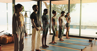 Buy stock photo Fitness, holistic health and people in yoga class together for start of wellness routine. Commitment, exercise and yogi group in line at studio for awareness, balance or dedication to mindfulness