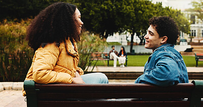 Buy stock photo Smile, love and couple on bench in park for outdoor date, bonding and care with relationship. Romance, happy man and woman with conversation, relax and weekend or holiday together for support