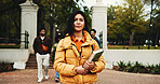 Woman, college student and books in portrait at campus, smile and pride with scholarship for education. Person, confidence and outdoor at academy for learning, development and study at university