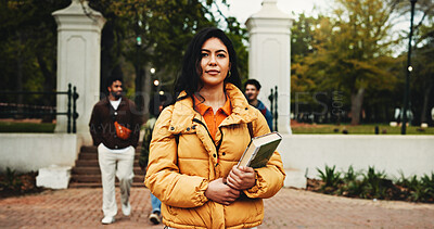 Buy stock photo Woman, college student and books in portrait at campus, smile and pride with scholarship for education. Person, confidence and outdoor at academy for learning, development and study at university