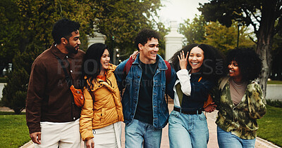 Buy stock photo Hug, outdoor and friends on university with connection, bonding or studying together on campus. Happy, education and students embracing and walking with scholarship, knowledge or learning at college.