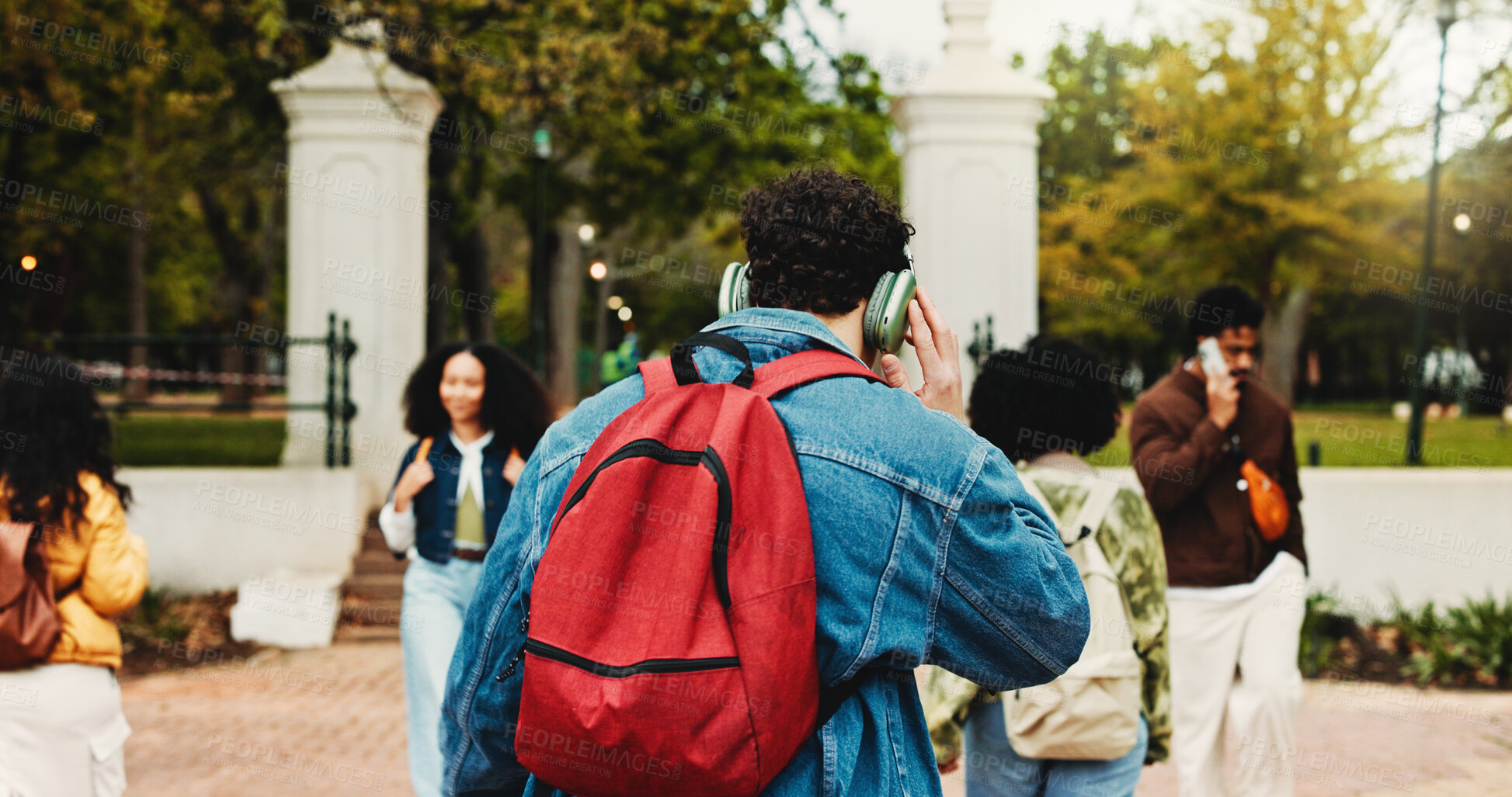 Buy stock photo Man, students and back with headphones at college, bag and education with streaming, scholarship or study. Person, audio and listen to music, learning and subscription at university campus for course