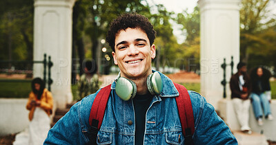 Buy stock photo College, portrait or man on campus with smile, knowledge or scholarship in study opportunity. Confident, university or student outdoor with headphones, higher education or pride in academic course.