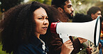 Woman, students and megaphone for protest outdoor for justice, free education and announcement. People, bullhorn and university rally for learning, equality and human rights of global discrimination