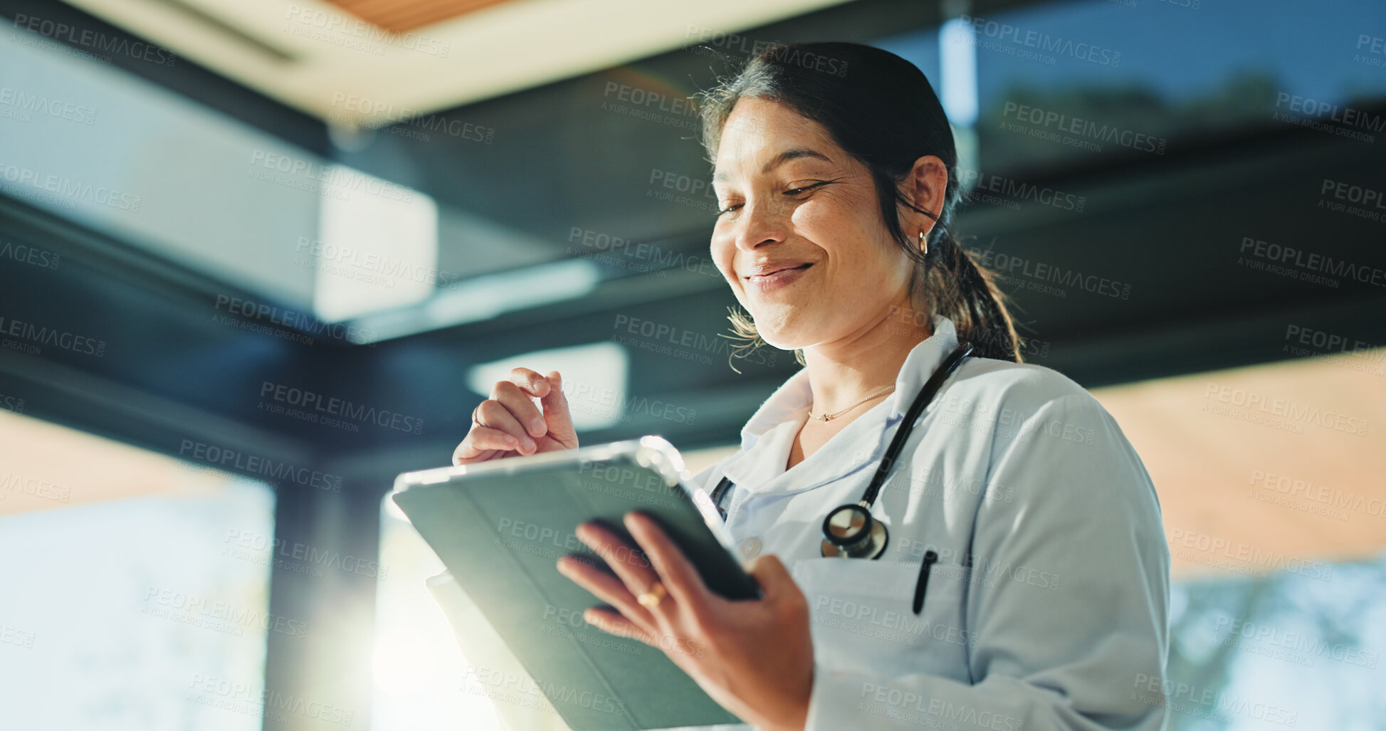 Buy stock photo Smile, doctor and woman with tablet for medical info, patient history or telehealth in clinic. Tech, healthcare professional and person in hospital with insurance records, wellness email or research