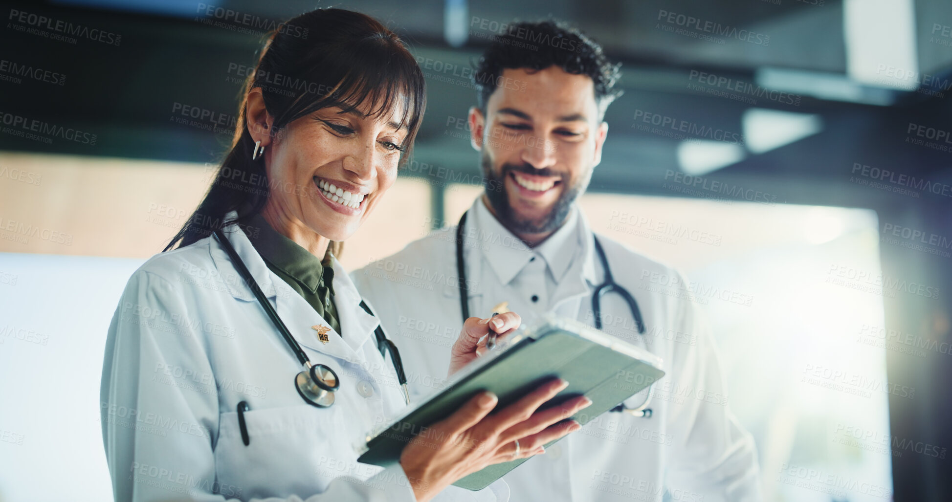 Buy stock photo People, doctor and reading with tablet in hospital for research, medical results and feedback. Staff, teamwork and digital for email, surgery schedule and healthcare information for diagnosis report