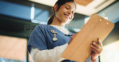 Buy stock photo Doctor, happy woman or writing with clipboard in clinic, medical record or instructions for care plan. Healthcare, patient treatment or person review chart for information, lab results or low angle