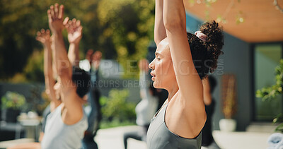 Buy stock photo Outdoor, woman and yoga class for fitness, stretching or holistic practice at wellness retreat. Yogi, group exercise and people at resort together for balance, healing or health with self care