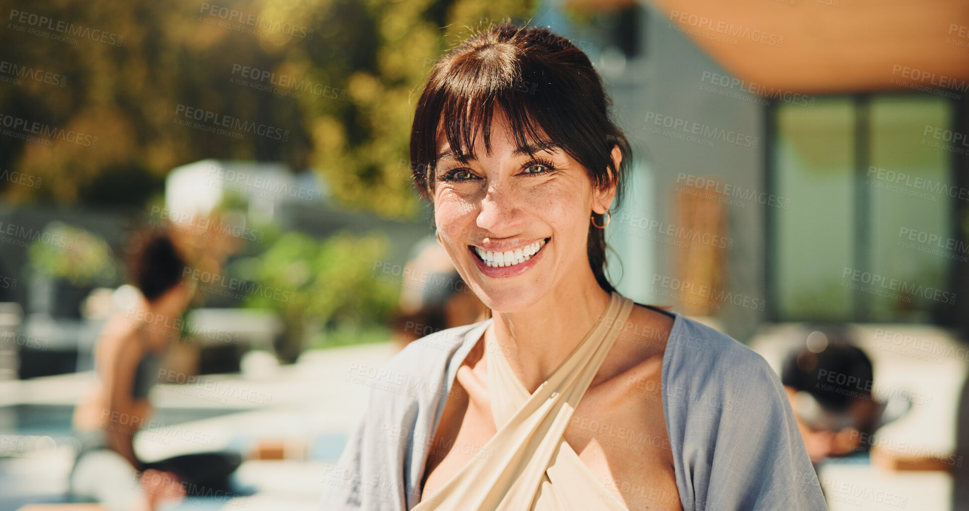 Buy stock photo Exercise, portrait and smile of happy yoga instructor outdoor for class or lesson with students at retreat. Fitness, wellness or zen and mature personal trainer in session with people for balance
