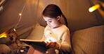 Night, child and relax with tablet in bedroom for ebook, reading fantasy and bedtime story. Late, girl and scroll with digital tech in home for online fairytale, kids storytelling app and literature.