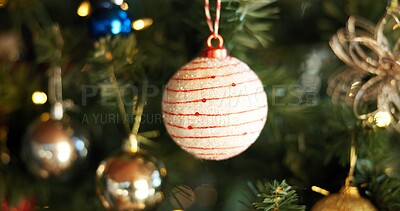 Buy stock photo Christmas, festive and wallpaper with bauble on tree in home for celebration, event or tradition. Background, decoration and holiday with ball in apartment for aesthetic, December or winter season