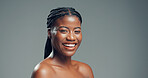 Portrait, skincare and black woman in studio, cosmetics and dermatology on grey background. Space, shine and African person with wellness, glow and beauty with confidence, healthy skin and aesthetic