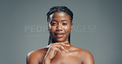 Buy stock photo Beauty, black woman and smile with skincare in studio for healthy skin, natural glow or radiance. Space, girl and portrait on gray background for acne treatment results, self care and wellness