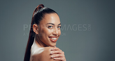 Buy stock photo Portrait, woman or shoulder in studio with skincare for beauty aesthetic, collagen or retinol benefits. Confident, person and happiness for dermatology, wellness and mockup space on gray background.