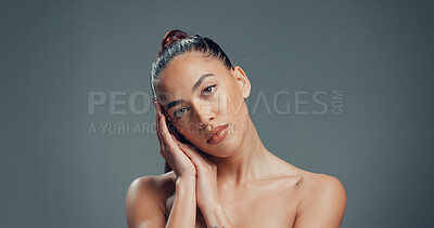 Buy stock photo Hands, beauty and portrait of woman in studio for skincare, self care and clear skin. Glow, dermatology and hydration with female person on gray background space for shine, aesthetic and collagen