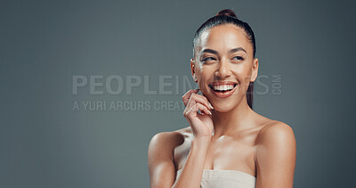 Buy stock photo Smile, skincare and mockup with woman in studio for beauty, self care and clear skin. Glow, dermatology and hydration with female person on gray background space for shine, aesthetic and collagen
