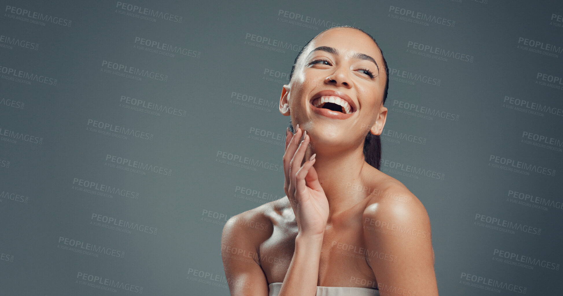 Buy stock photo Laughing, skincare and hands with woman in studio for beauty, self care and clear skin. Glow, dermatology and hydration with female person on gray background space for shine, aesthetic and mockup