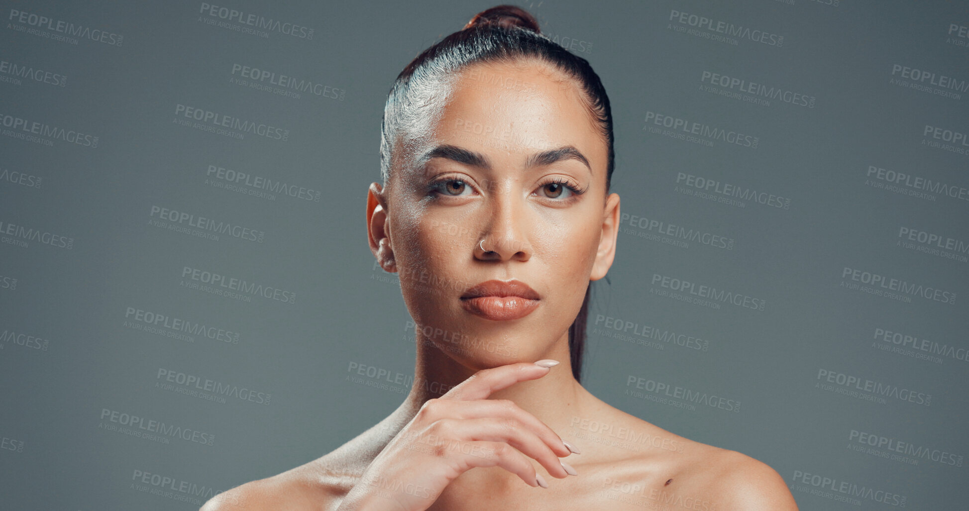 Buy stock photo Serious, skincare and portrait of woman in studio for beauty, self care and clear skin. Glow, dermatology and hydration with person on gray background space for shine, aesthetic and collagen