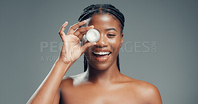 Buy stock photo Skincare, lotion and portrait of black woman in studio for beauty, glow and self care cosmetics. Shine, dermatology and aesthetic with person and cream on gray background space for hydration product