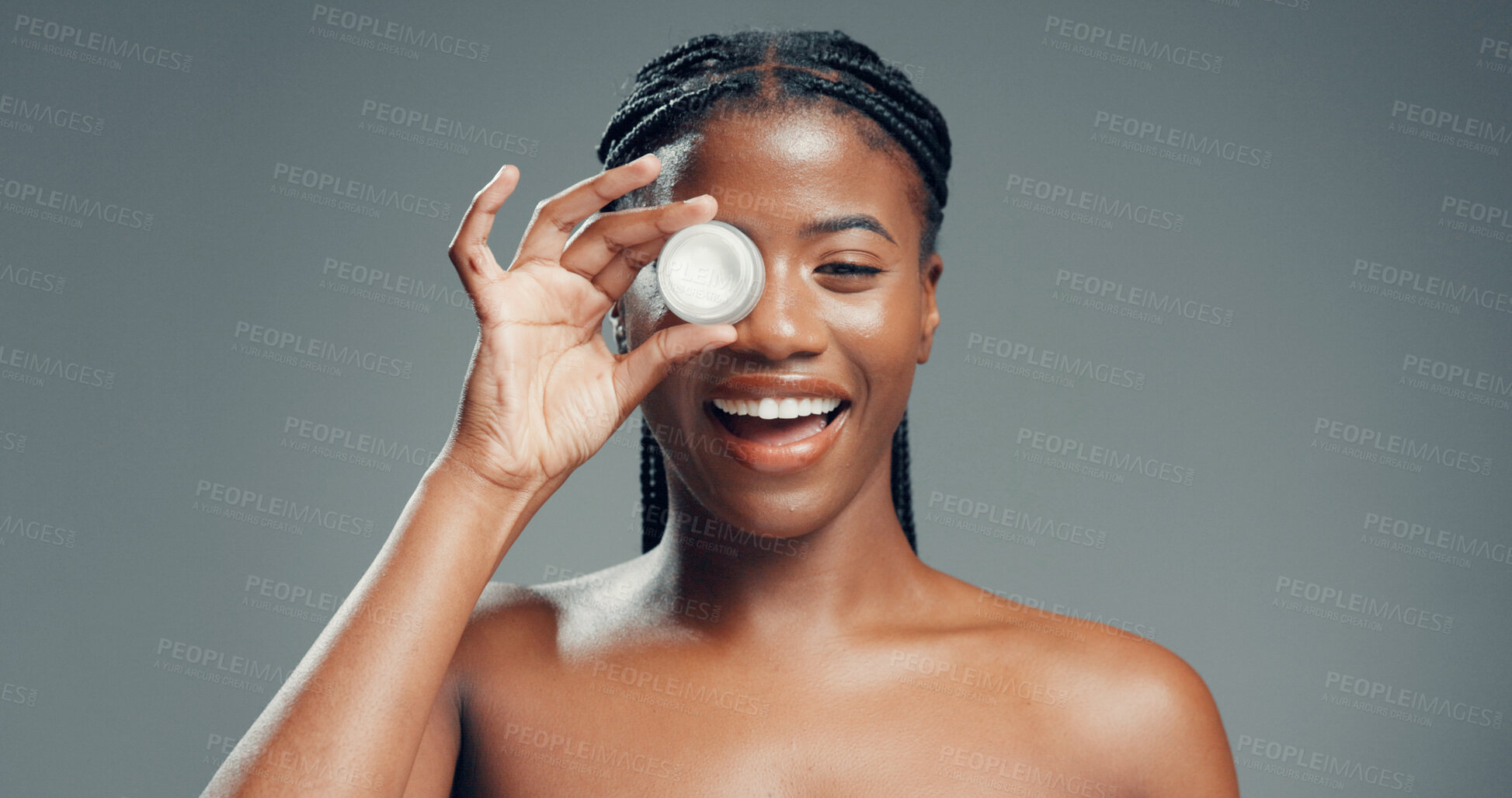 Buy stock photo Skincare, lotion and portrait of black woman in studio for beauty, glow and self care cosmetics. Shine, dermatology and aesthetic with person and cream on gray background space for hydration product