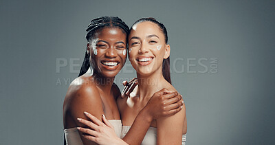 Buy stock photo Beauty, cream and portrait of women in studio for skincare, glow and self care diversity. Shine, dermatology and aesthetic with people on gray background space for lotion, hydration and support