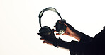 Hands, person and advertising headphones in studio for audio, streaming music and sound equipment. Mockup space, brand ambassador or accessory promotion on white background for podcast, radio or song