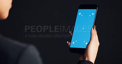 Buy stock photo Cellphone, green screen and hand of woman in studio with networking, communication or social media on mobile app. Phone, space and female person with tech for contact with email by black background.